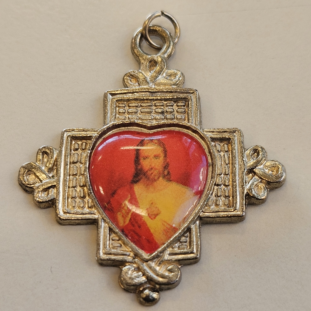Sacred Heart Jesus Heart-Shaped Religious Pendant - Gold Tone w/Red Background.